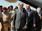 Iraqi Prime Minister Nouri al-Maliki (center) arrives on May 8 at Kirkuk airport in northern Iraq, on his first visit to the multi-ethnic city since taking office. Iraqi Prime Minister Nouri al-Maliki (center) arrives on May 8 at Kirkuk airport in northern Iraq, on his first visit to the multi-ethnic city since taking office.