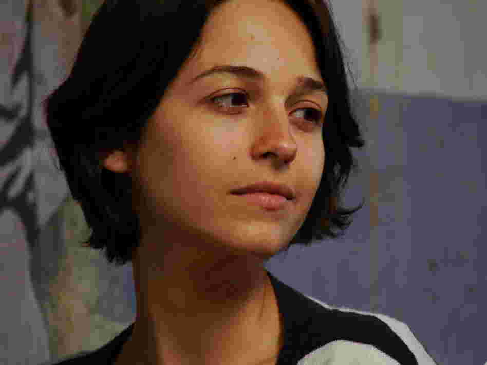 Rita (Lisa Favero) relates to the town's residents as relics of another time, appreciating them with an outsider's view, yet not truly connecting.