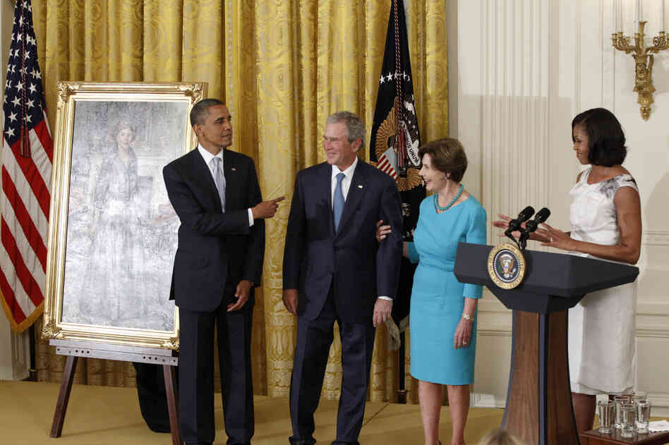 President Obama and his wife Michelle host a rare get-together with their White House predecessors on Thursday, as former President George W. Bush and his wife Laura had their official portraits unveiled.
