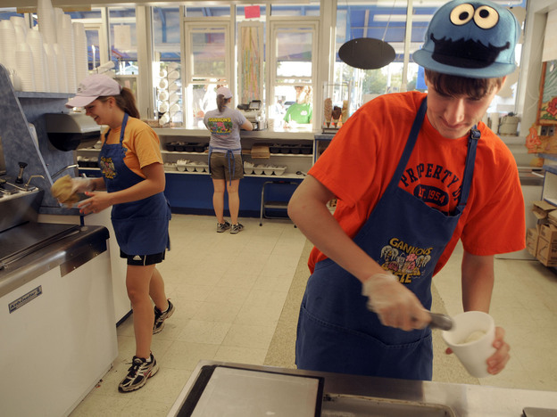 Tom Auffhammer, 17 (right) scoops ice cream in Syracuse, N.Y. Teens continue to face stiff competition for summer jobs, but a downward trend in summer hiring for teens actually predates the recession.