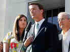 Former U.S. Sen. John Edwards addresses the media alongside his daughter Cate Edwards and his parents Wallace and Bobbie Edwards yesterday after the conclusion of his trial on campaign finance charges.