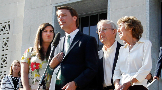 Former U.S. Sen. John Edwards addresses the media alongside his daughter Cate Edwards and his parents Wallace and Bobbie Edwards yesterday after the conclusion of his trial on campaign finance charges.