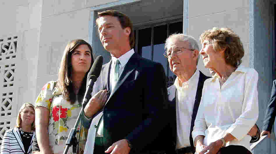 Former U.S. Sen. John Edwards addresses the media alongside his daughter Cate Edwards and his parents Wallace and Bobbie Edwards yesterday after the conclusion of his trial on campaign finance charges.