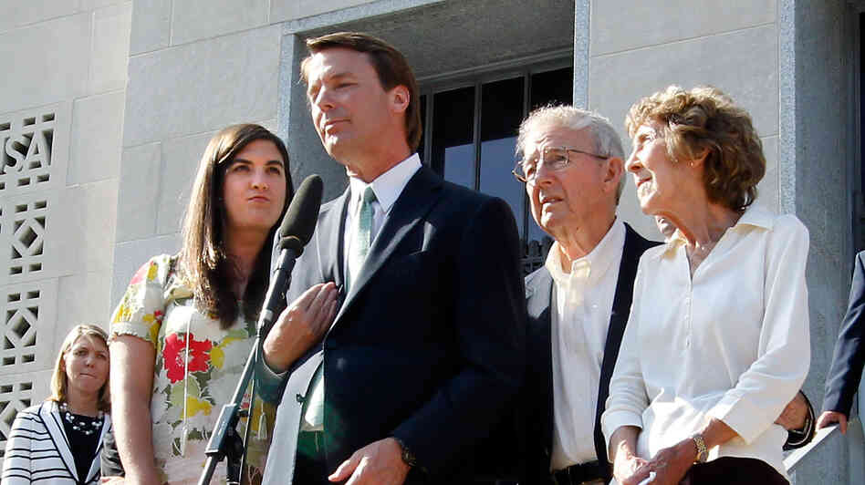 Former U.S. Sen. John Edwards addresses the media alongside his daughter Cate Edwards and his parents Wallace and Bobbie Edwards yesterday after the conclusion of his trial on campaign finance charges.