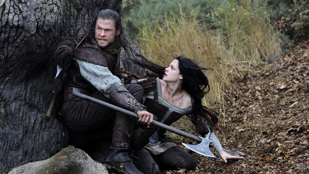The huntsman (Chris Hemsworth) is promised that his beloved wife will be brought back from the dead if he captures Snow White (Kristen Stewart.)