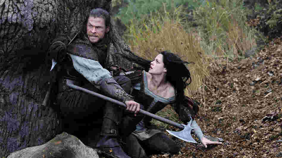 The huntsman (Chris Hemsworth) is promised that his beloved wife will be brought back from the dead if he captures Snow White (Kristen Stewart.)