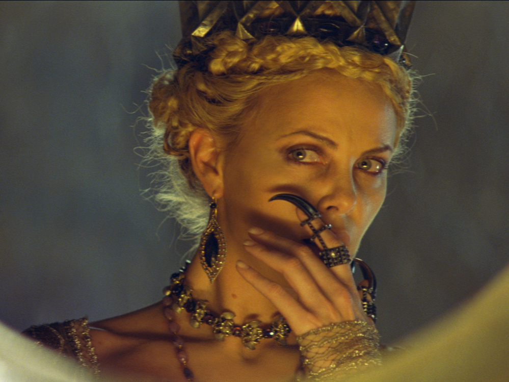 Charlize Theron plays Queen Ravenna, who literally sucks the life out of female prisoners to keep herself looking young and vibrant.