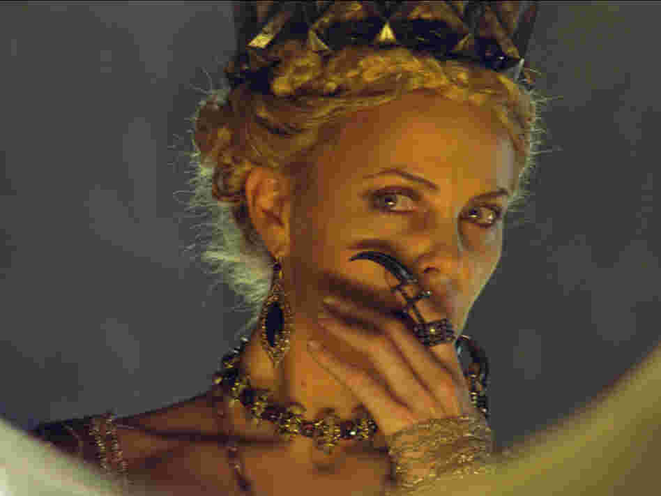 Charlize Theron plays Queen Ravenna, who literally sucks the life out of female prisoners to keep herself looking young and vibrant.