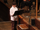 Very Young Composer Milo Poniewozik at the New York Philharmonic's School Day Concerts, where his piece was performed in front of more than 2,000 kids. Very Young Composer Milo Poniewozik at the New York Philharmonic's School Day Concerts, where his piece was performed in front of more than 2,000 kids.
