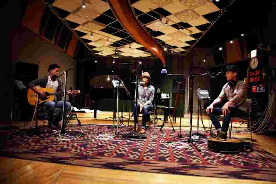 Brandi Carlile performs in NPR's Studio 4A, backed by brothers Tim (left) and Phil Hanseroth.