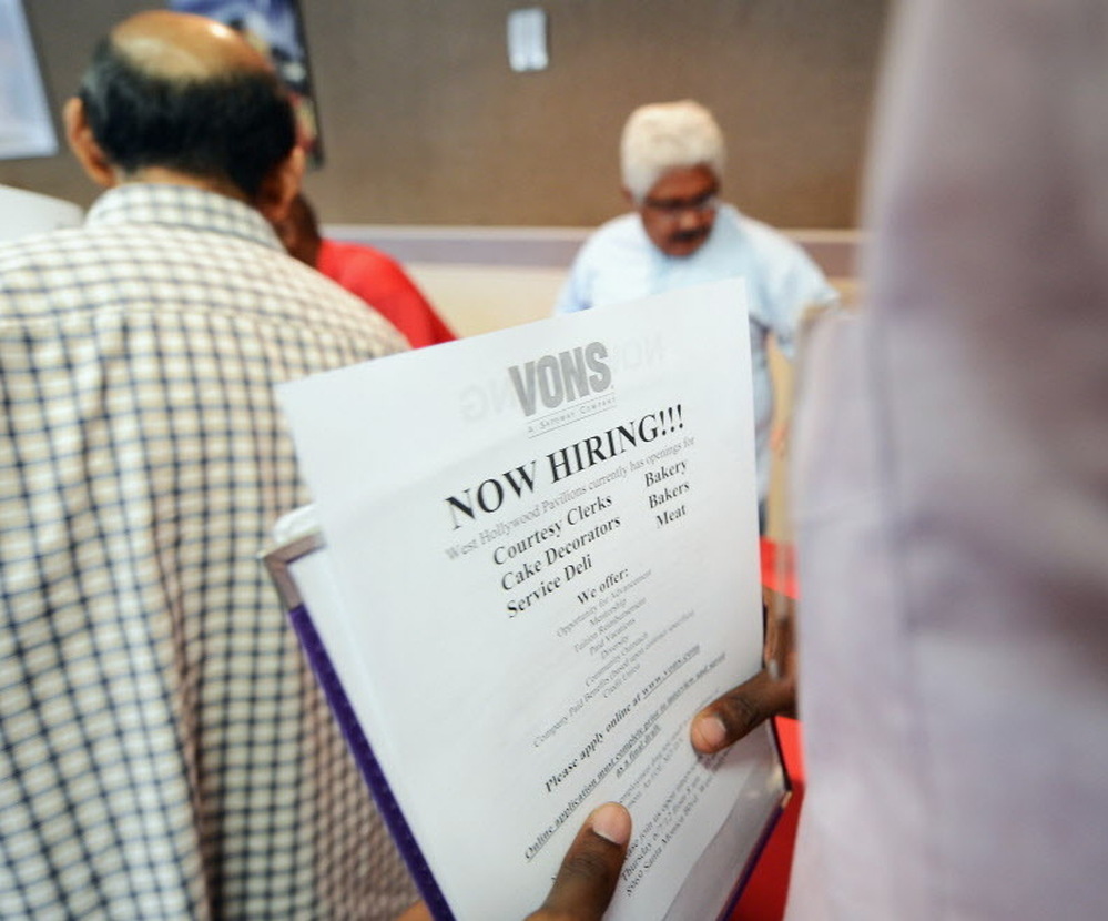 Hoping for work: Job seekrs lined up Thursday at a job fair in Los Angeles.