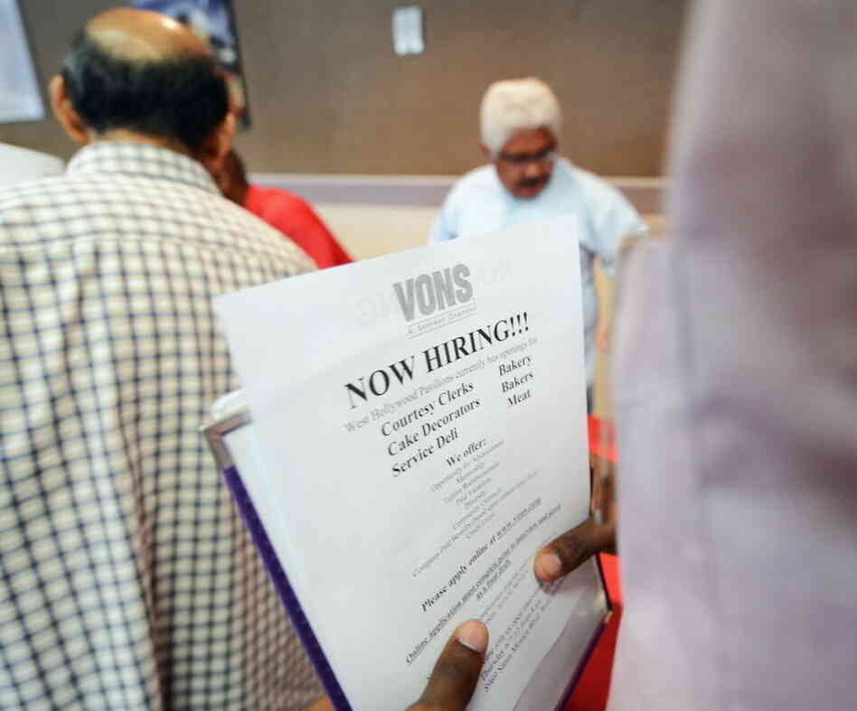 Hoping for work: Job seekrs lined up Thursday at a job fair in Los Angeles.