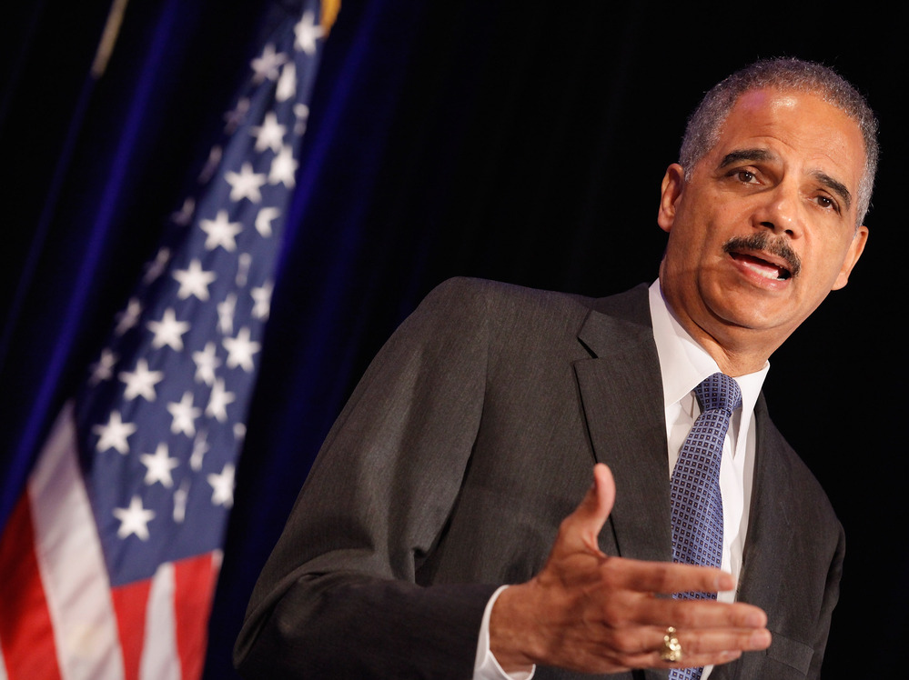 Attorney General Eric Holder addresses the Congressional Black Caucus Faith Leaders Summit and National Black Churches Annual Consultation on Wednesday in Washington.
