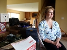 Cathy Yamauchi has been waiting since Thanksgiving to hear from her mortgage lender regarding a short sale of her home in Ramsey, Minn. She is planning to move to a townhome, but is mostly living out of boxes while waiting on the short sale. Cathy Yamauchi has been waiting since Thanksgiving to hear from her mortgage lender regarding a short sale of her home in Ramsey, Minn. She is planning to move to a townhome, but is mostly living out of boxes while waiting on the short sale.