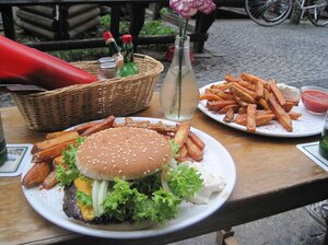 At Room 77, this cheeseburger will cost you 2 Bitcoin. That's about four Euro or five dollars.