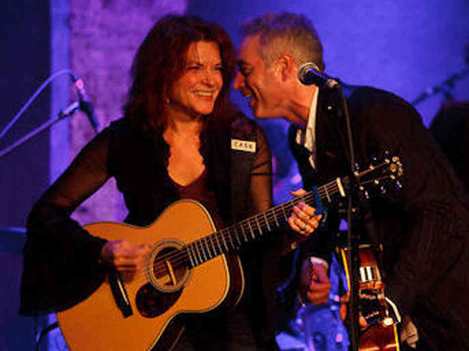 Rosanne Cash on the Cabinet of Wonders stage with John Wesley Harding. Rosanne Cash on the Cabinet of Wonders stage with John Wesley Harding.