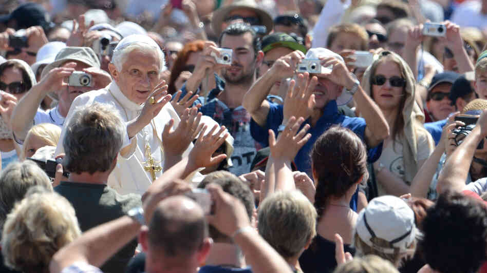 Pope Benedict XVI waves as he arrives for his weekly general audience on May 30 at St. Peter's Square at the Vatican.