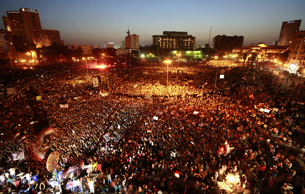 Egyptians gather at Tahrir Square in Cairo to call for a new revolution Saturday. A court sentenced ousted President Hosni Mubarak and his interior minister to life in prison, but acquitted six security chiefs in the deaths of protesters last year.