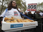 Protesters gather outside Downing Street in London to deliver a petition against the so-called "pasty tax," a government bid to levy 20 percent tax on hot takeaway food. Protesters gather outside Downing Street in London to deliver a petition against the so-called "pasty tax," a government bid to levy 20 percent tax on hot takeaway food.