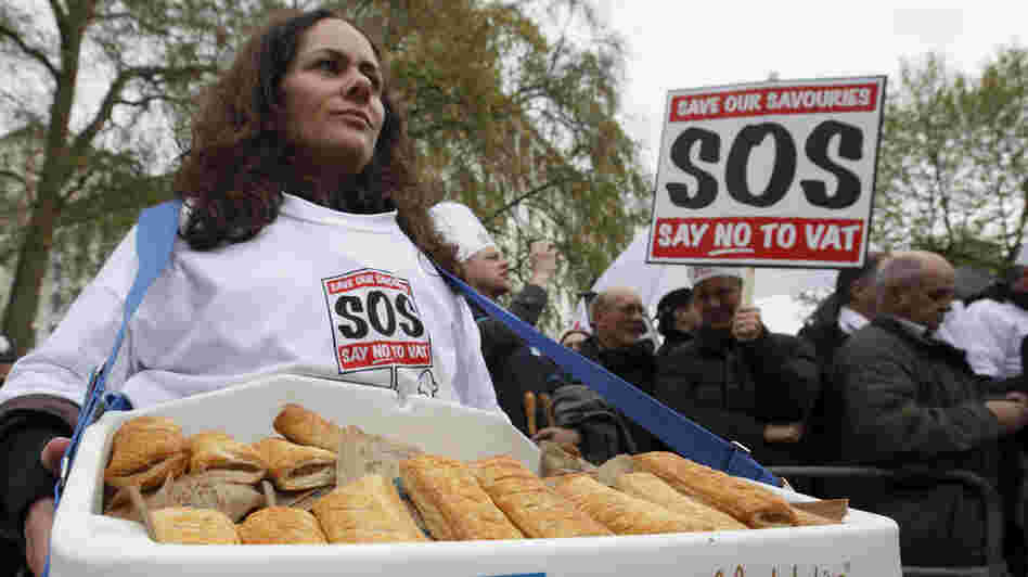 Protesters gather outside Downing Street in London to deliver a petition against the so-called "pasty tax," a government bid to levy 20 percent tax on hot takeaway food.