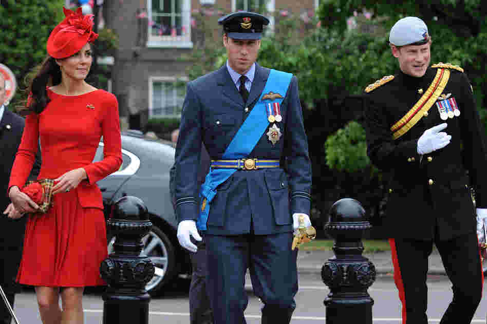 The queen's grandson Prince William and his wife, the Duchess of Cambridge — he in his Royal Air Force uniform, she in a red Alexander McQueen dress — and William's brother, Prince Harry, were among senior royals who joined the queen and her husband, Prince Philip.