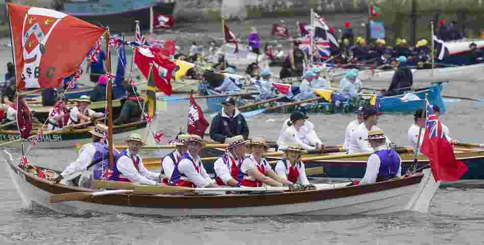Hundreds of thousands of Union Jack-waving spectators formed a red, white and blue wave along London's riverbanks and bridges, cheering the 86-year-old monarch and her armada of motorboats, rowboats and sailboats of all shapes and sizes.