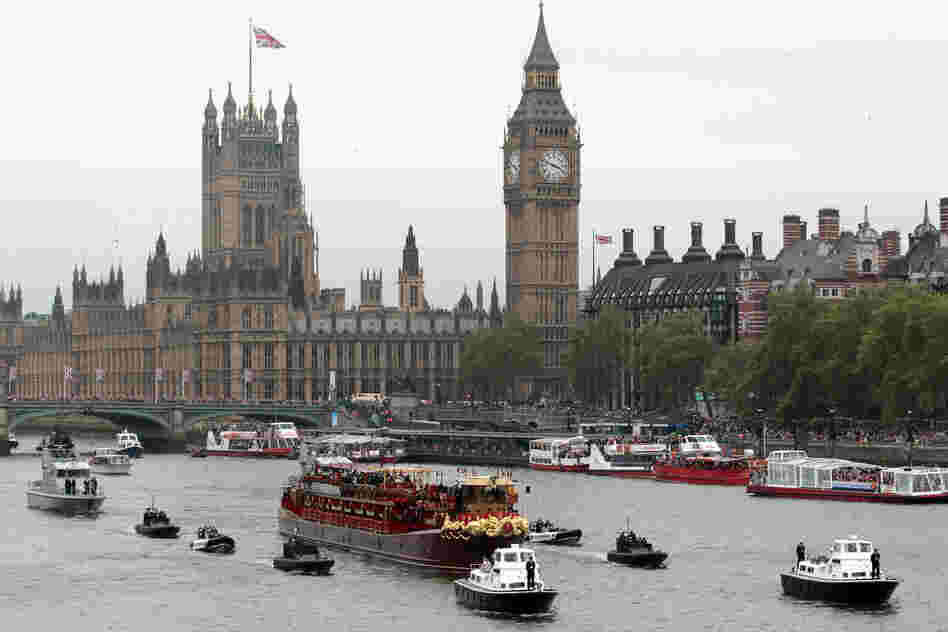 Queen Elizabeth II sailed down the River Thames on Sunday amid a motley but majestic flotilla of 1,000 vessels, mustered to mark her 60 years on the British throne.