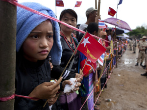 Ethnic Karen refugees waited hours for Suu Kyi to arrive at the Mae La refugee camp.