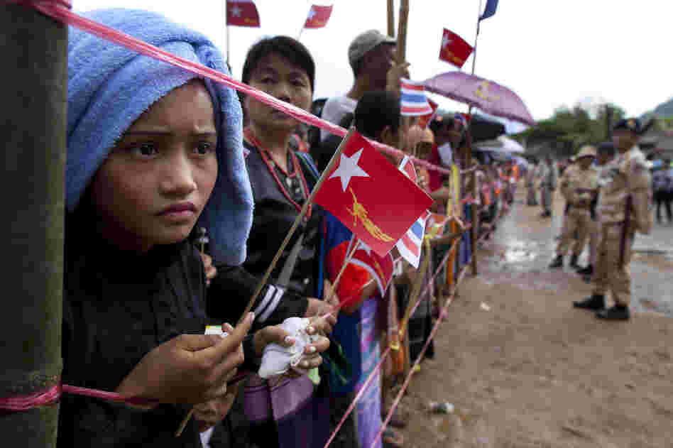 Ethnic Karen refugees waited hours for Suu Kyi to arrive at the Mae La refugee camp.