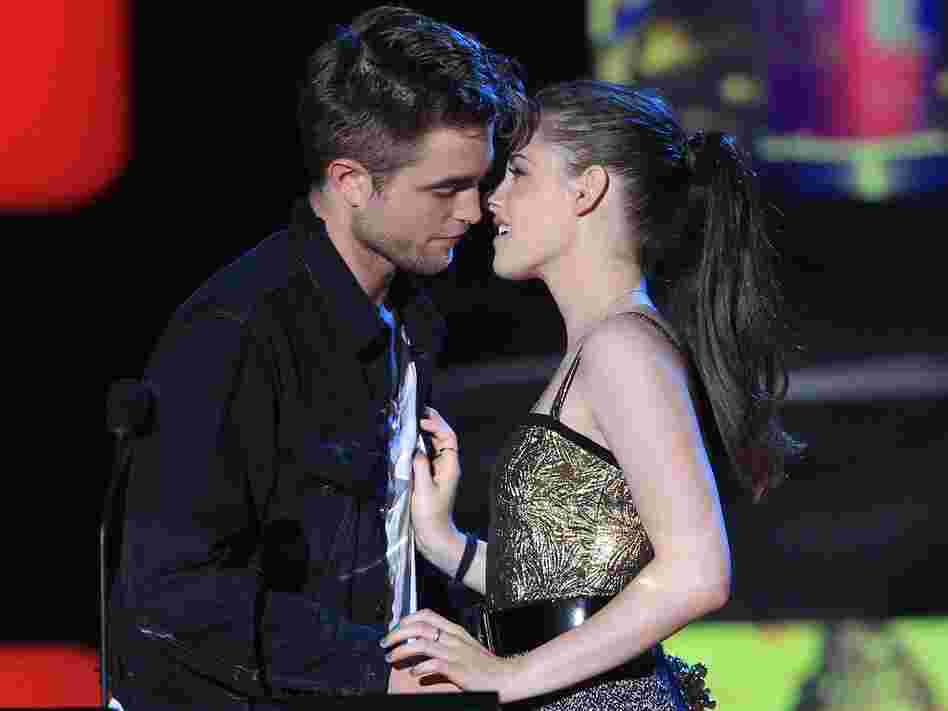 Robert Pattinson and Kristen Stewart accept the MTV Movie Award for Best Kiss (really!) at the 2010 ceremony.