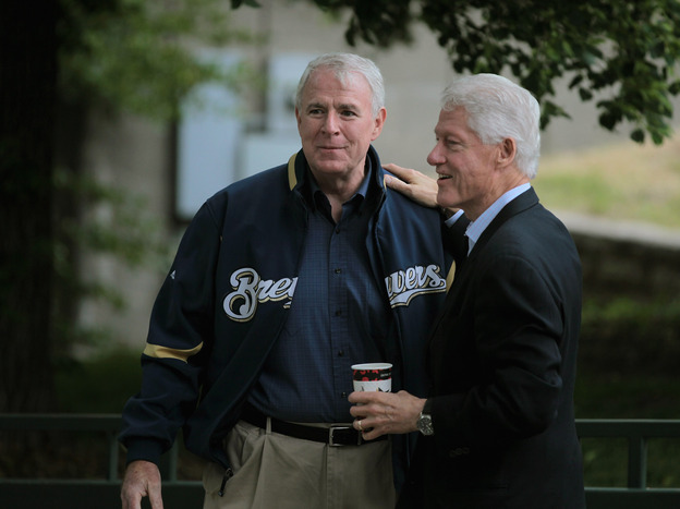 Milwaukee Mayor Tom Barrett greets former President Clinton at a Get Out The Vote Rally on Friday.