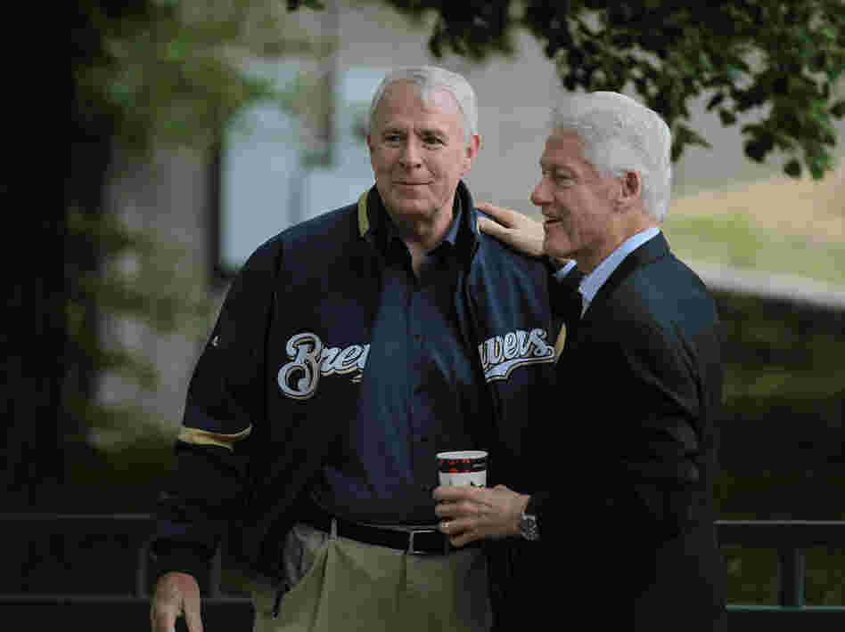 Milwaukee Mayor Tom Barrett greets former President Clinton at a Get Out The Vote Rally on Friday.