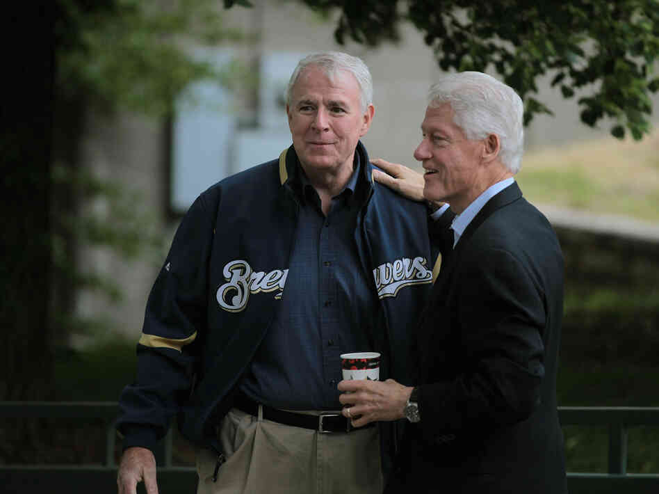 Milwaukee Mayor Tom Barrett greets former President Clinton at a Get Out The Vote Rally on Friday.