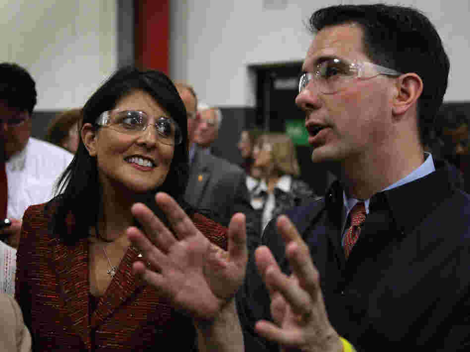 South Carolina Gov. Nikki Haley and Wisconsin Gov. Scott Walker tour Quad Graphics during a campaign stop for Walker in Sussex, Wis., last week.