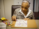 Maryland resident Ida Christian, 89, began showing symptoms of Alzheimer's disease in 2009. Her daughter, Geneva Hunter, and granddaughter, Yolanda, decided to take a hands-on approach to Ida's care. Ida lives with Geneva, and Yolanda quit her job to become Ida's daytime caregiver. Maryland resident Ida Christian, 89, began showing symptoms of Alzheimer's disease in 2009. Her daughter, Geneva Hunter, and granddaughter, Yolanda, decided to take a hands-on approach to Ida's care. Ida lives with Geneva, and Yolanda quit her job to become Ida's daytime caregiver.