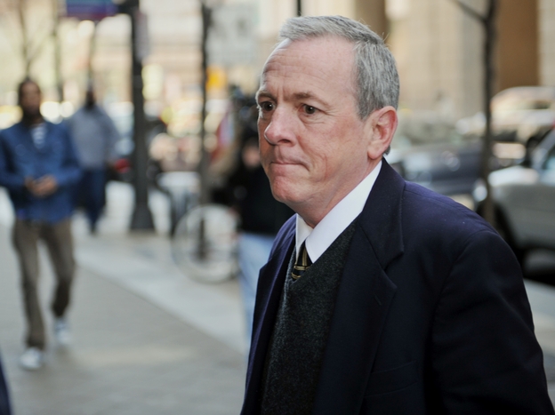 The Rev. James Brennan returns after a lunch break to Philadelphia Criminal Justice Center Mar. 26, 2012.