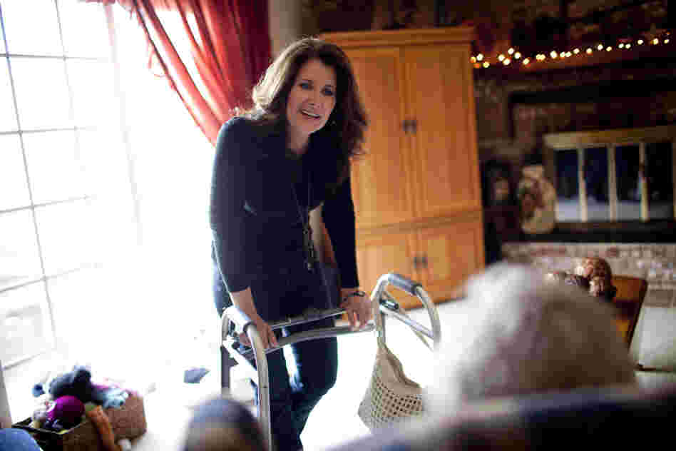 Kelley talks with AnnaBelle in her family room. Although caring for AnnaBelle is demanding, LaDonna says, "I grew up down South, and I think your family should stay with you. That's how I was raised ... but the expense is a big thing."