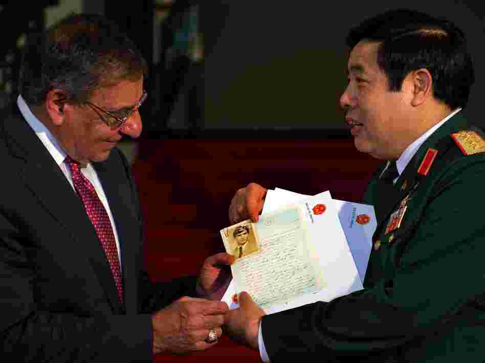 Vietnamese Minister of Defense Phuong Quang Thanh (right) presents the personal letters of U.S. Army Sgt. Steve Flaherty to Defense Secretary Leon Panetta. Vietnamese Minister of Defense Phuong Quang Thanh (right) presents the personal letters of U.S. Army Sgt. Steve Flaherty to Defense Secretary Leon Panetta.