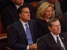 Mitt and Ann Romney sit behind Michael Leavitt and his wife Jacqueline at the February 2008 funeral of Gordon B. Hinckley, leader of the Church of Jesus Christ of Latter-day Saints. Romney reportedly has chosen Leavitt to lead his transition team. Mitt and Ann Romney sit behind Michael Leavitt and his wife Jacqueline at the February 2008 funeral of Gordon B. Hinckley, leader of the Church of Jesus Christ of Latter-day Saints. Romney reportedly has chosen Leavitt to lead his transition team.