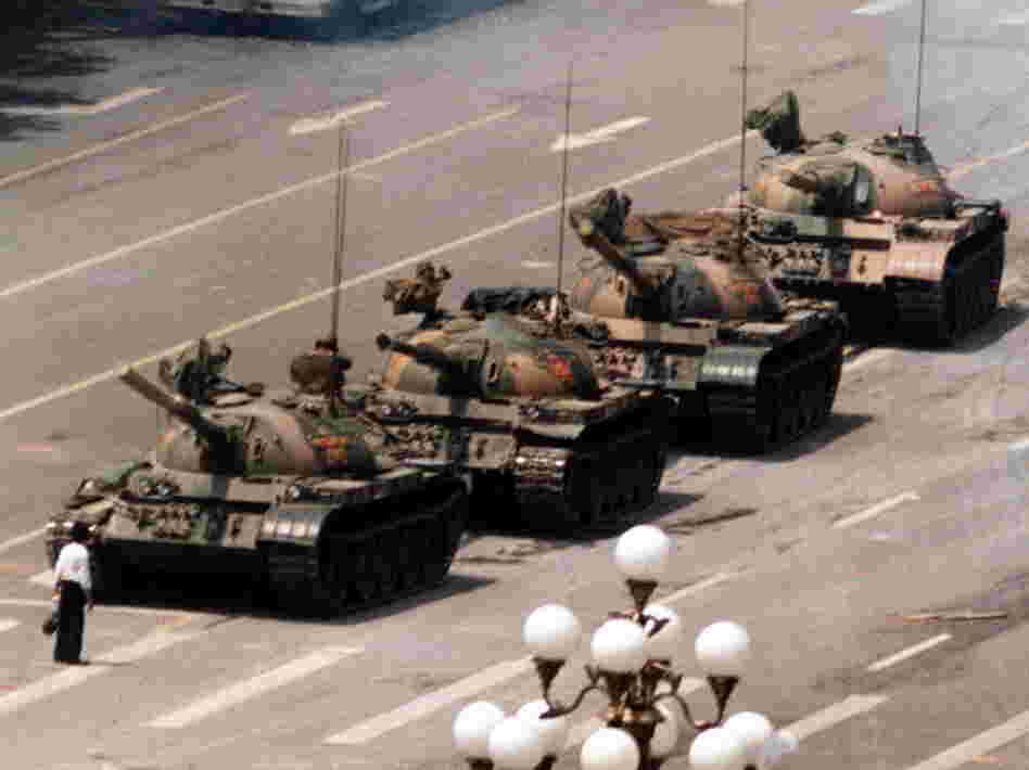 A Chinese protester, calling for an end to the violence against pro-democracy demonstrators at Tiananmen Square, blocks a line of tanks on June 5, 1989. A Chinese protester, calling for an end to the violence against pro-democracy demonstrators at Tiananmen Square, blocks a line of tanks on June 5, 1989.