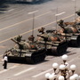 A Chinese protester, calling for an end to the violence against pro-democracy demonstrators at Tiananmen Square, blocks a line of tanks on June 5, 1989.