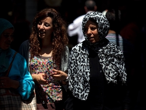 Tunisian women walk through the narrow streets of Tunis' medina, or marketplace. Compared to women in other Arab countries, Tunisian women have had access to education and job opportunities for decades. Tunisian women walk through the narrow streets of Tunis' medina, or marketplace. Compared to women in other Arab countries, Tunisian women have had access to education and job opportunities for decades.