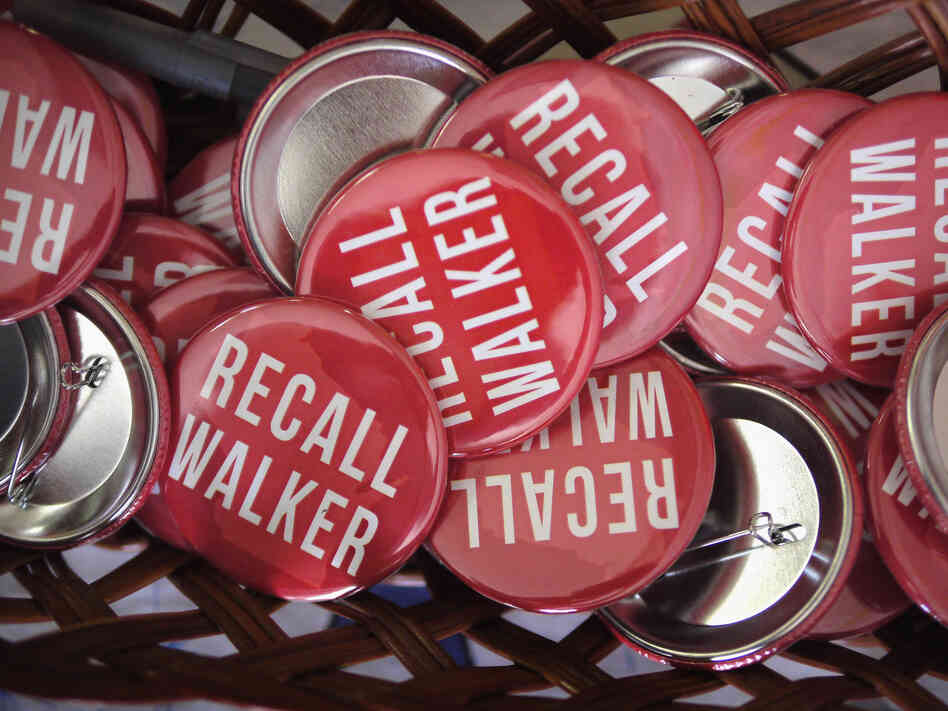 "Recall Walker" buttons at the Rock County Democratic Party Headquarters Monday in Janesville, Wis.