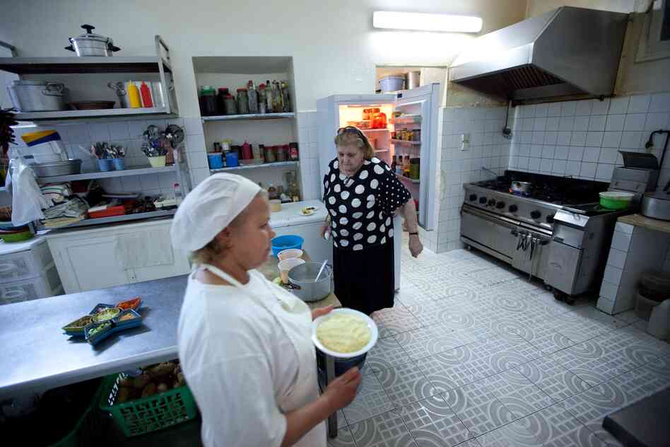 LaLoush's mother, Lily, and chef Hadia Ben Mahmoud prepare dinner in the family restaurant, Mamy Lily.