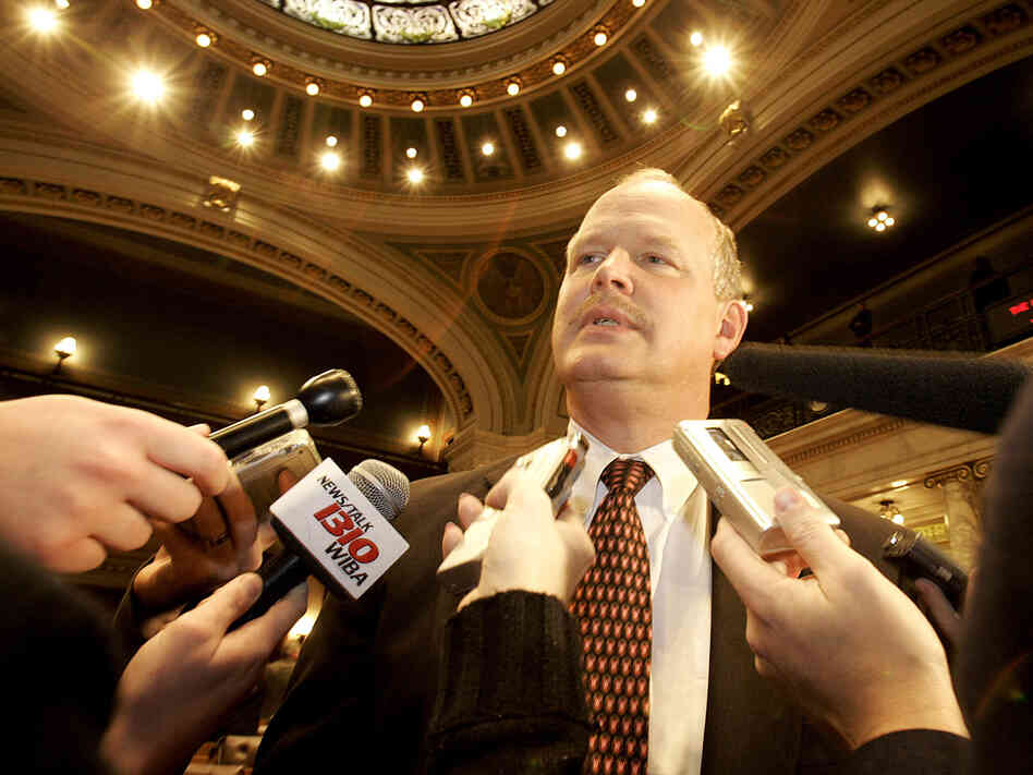 Last year, Dale Schultz was the only Republican state senator to vote against Gov. Scott Walker's rollback of public union collective bargaining rights. Here, he speaks to reporters at the state Capitol in 2006.