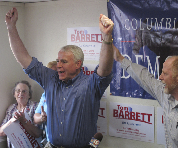 Democrat Tom Barrett rallies supporters inside his campaign office on Monday in Portage, Wis.