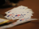 Stickers are given to voters Tuesday in Milwaukee. Wisconsin voters are choosing between Republican Gov. Scott Walker and Democratic challenger Tom Barrett in a recall election. Stickers are given to voters Tuesday in Milwaukee. Wisconsin voters are choosing between Republican Gov. Scott Walker and Democratic challenger Tom Barrett in a recall election.