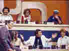 The participants on an early episode of Match Game, including Richard Dawson in the lower center position. The participants on an early episode of Match Game, including Richard Dawson in the lower center position.