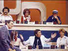 The participants on an early episode of Match Game, including Richard Dawson in the lower center position. The participants on an early episode of Match Game, including Richard Dawson in the lower center position.