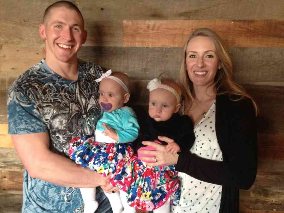 Terran Echegoyen-McCabe, her husband and 10-month-old twins.